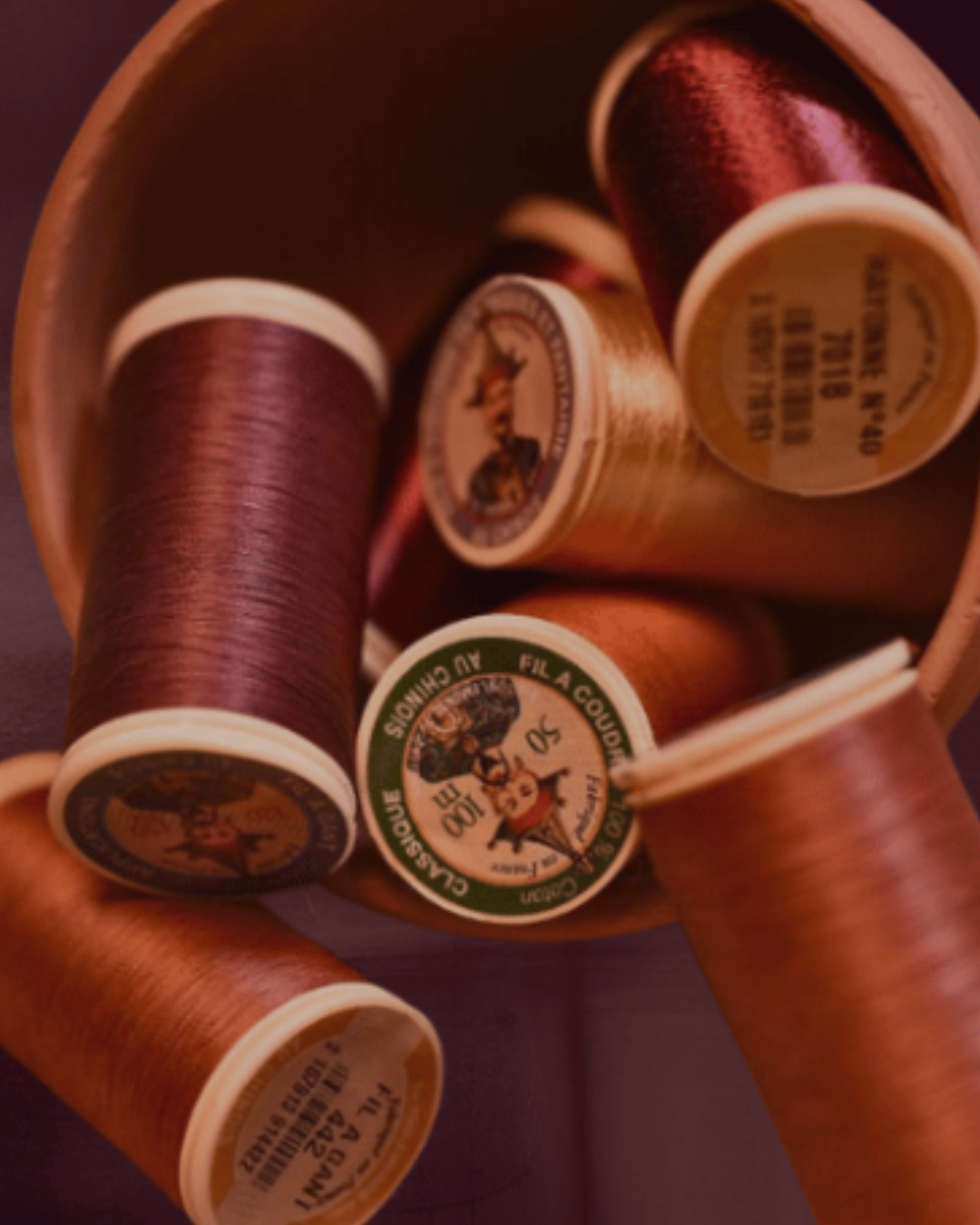 Bint Saeed—premium tailoring threads for luxury abaya construction; materials chosen for durability, consistency, and refined finish